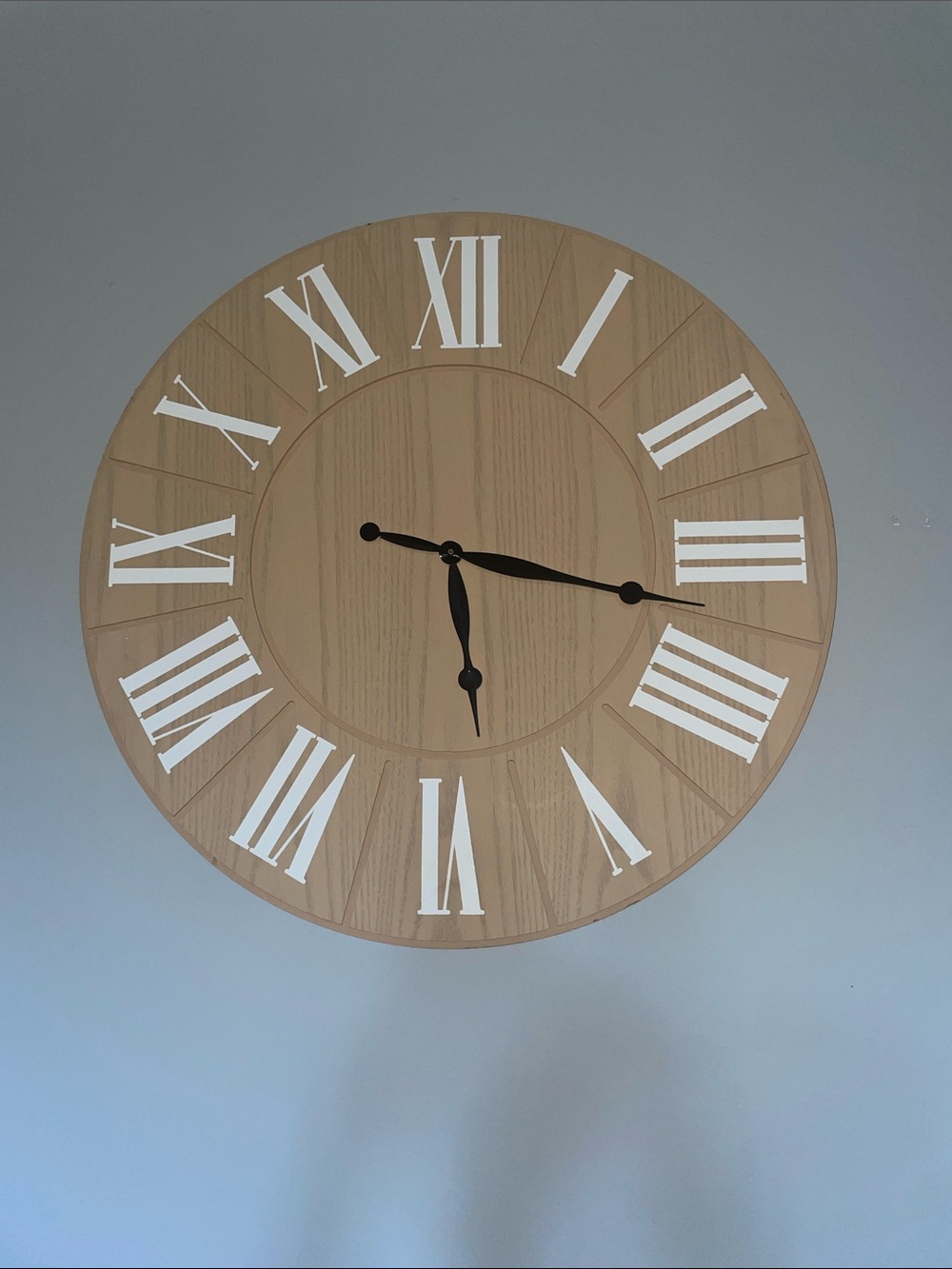 Classic Wood-Tone Wall Clock with White Roman Numerals